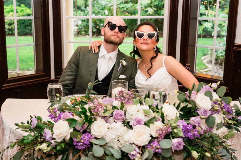 Portland wedding photographer bride and groom at sweetheart table